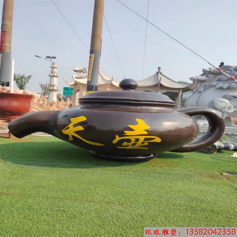 流水壺雕塑表面顏色可以做金色或者紫砂壺色